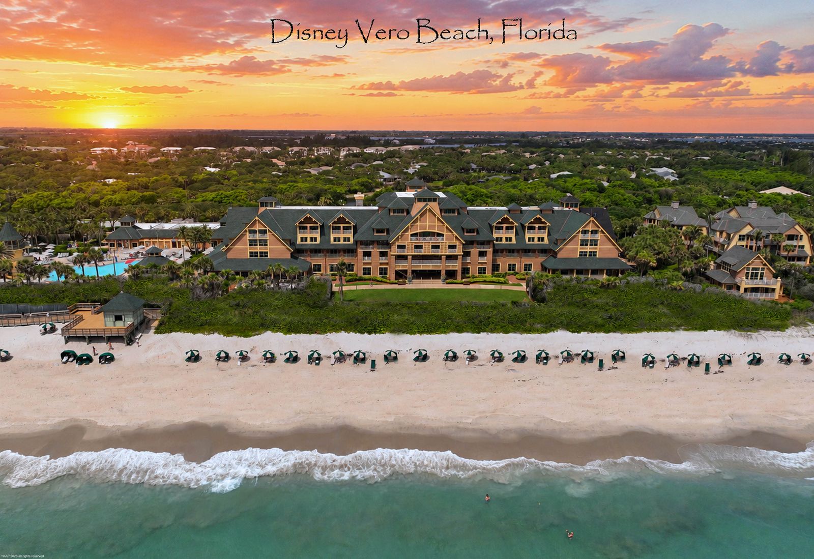 Aerial of Disney's Vero Beach Resort at sunset, its beach and the Atlantic in front