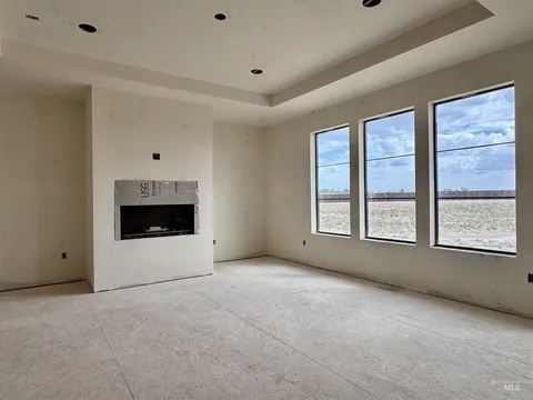 The fireplace wall as it stands, before any styling.